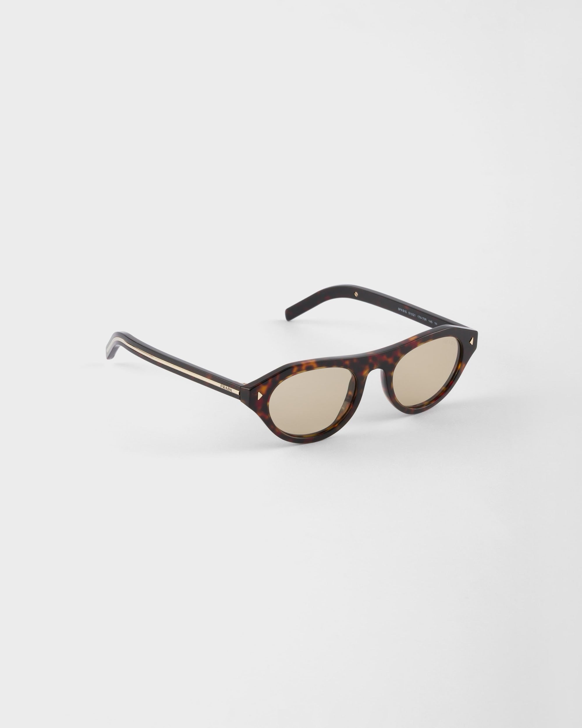 Prada Sunglasses with Iconic Metal Plaque – Chamomile Yellow (51-21-145)