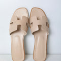 HERMES Women’s Oran Sandal – nude beige