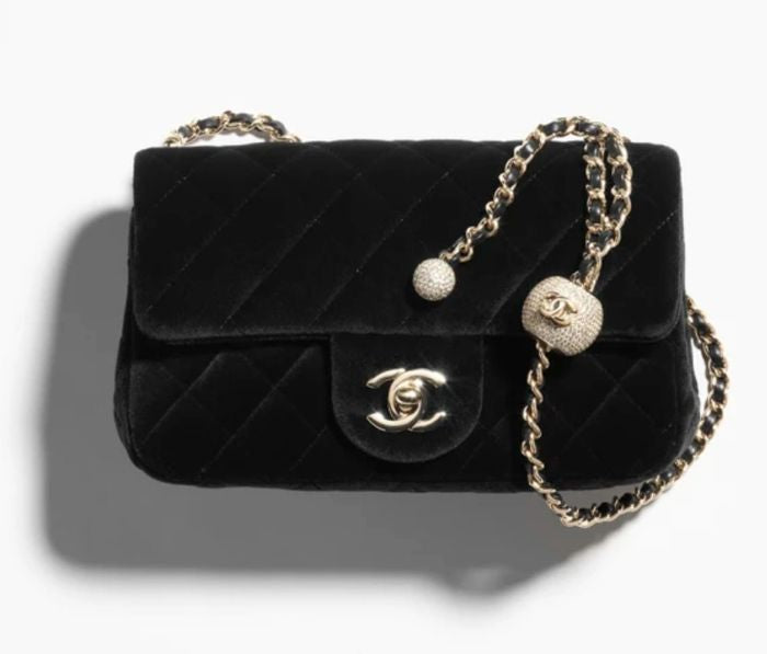 CHANEL
Velvet mini flap bag