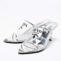 PRADA Women’s Logo Print Plexiglass Heels – 8cm Silver Pumps