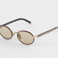 Prada Sunglasses with Iconic Metal Plaque – Camomile Lenses