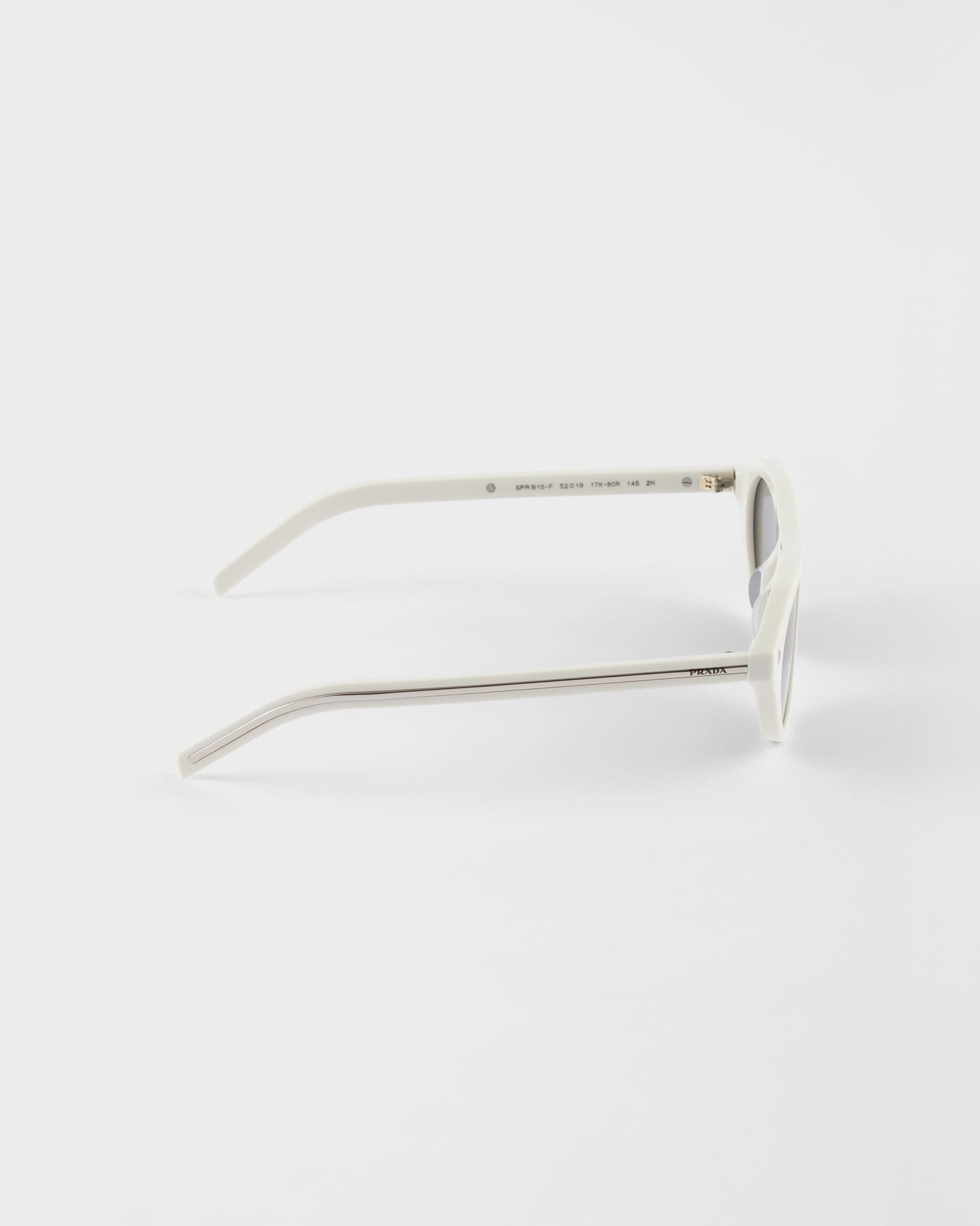 Prada Sunglasses with Iconic Metal Plaque – White